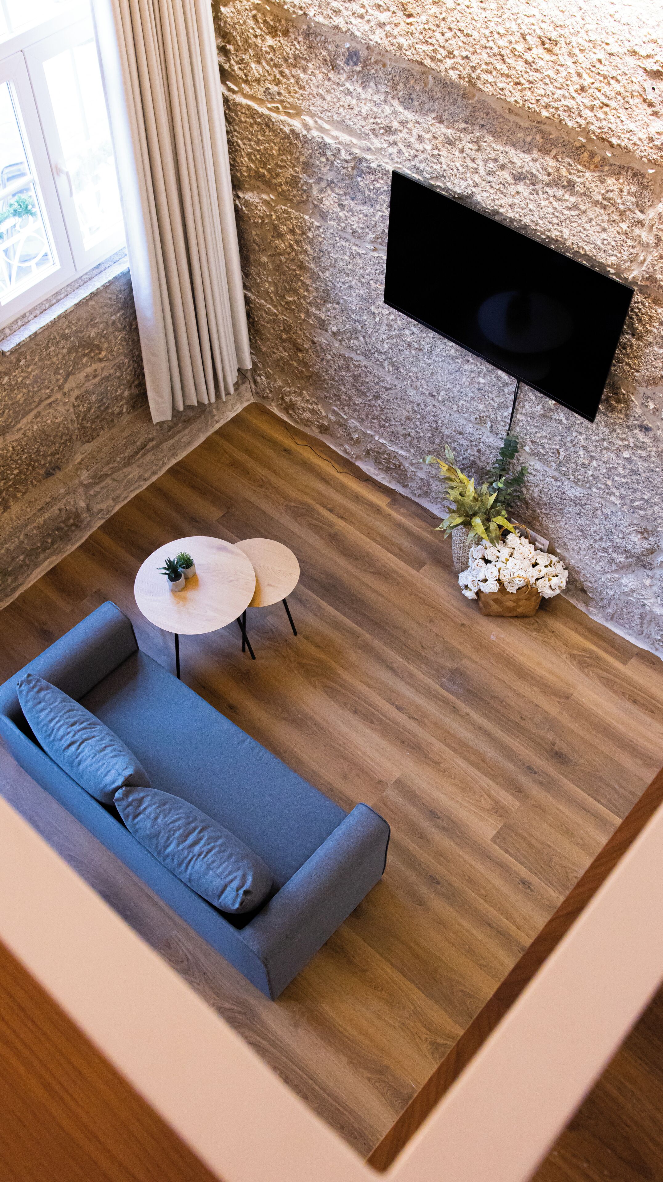 Loft urbà | Sala d&#x27;estar | Televisor de pantalla plana de 20 polzades amb canals per cable 