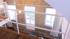 City Loft | Living area | 20-inch flat-screen TV with cable channels