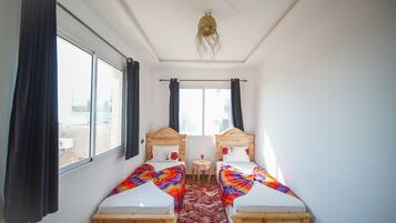 3 slaapkamers, een strijkplank/strijkijzer, wifi, beddengoed