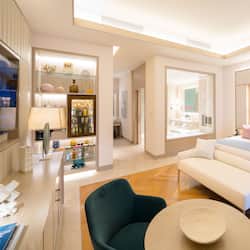 Premium bedding, down comforters, pillowtop beds, free minibar items