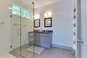Shower, hair dryer, towels