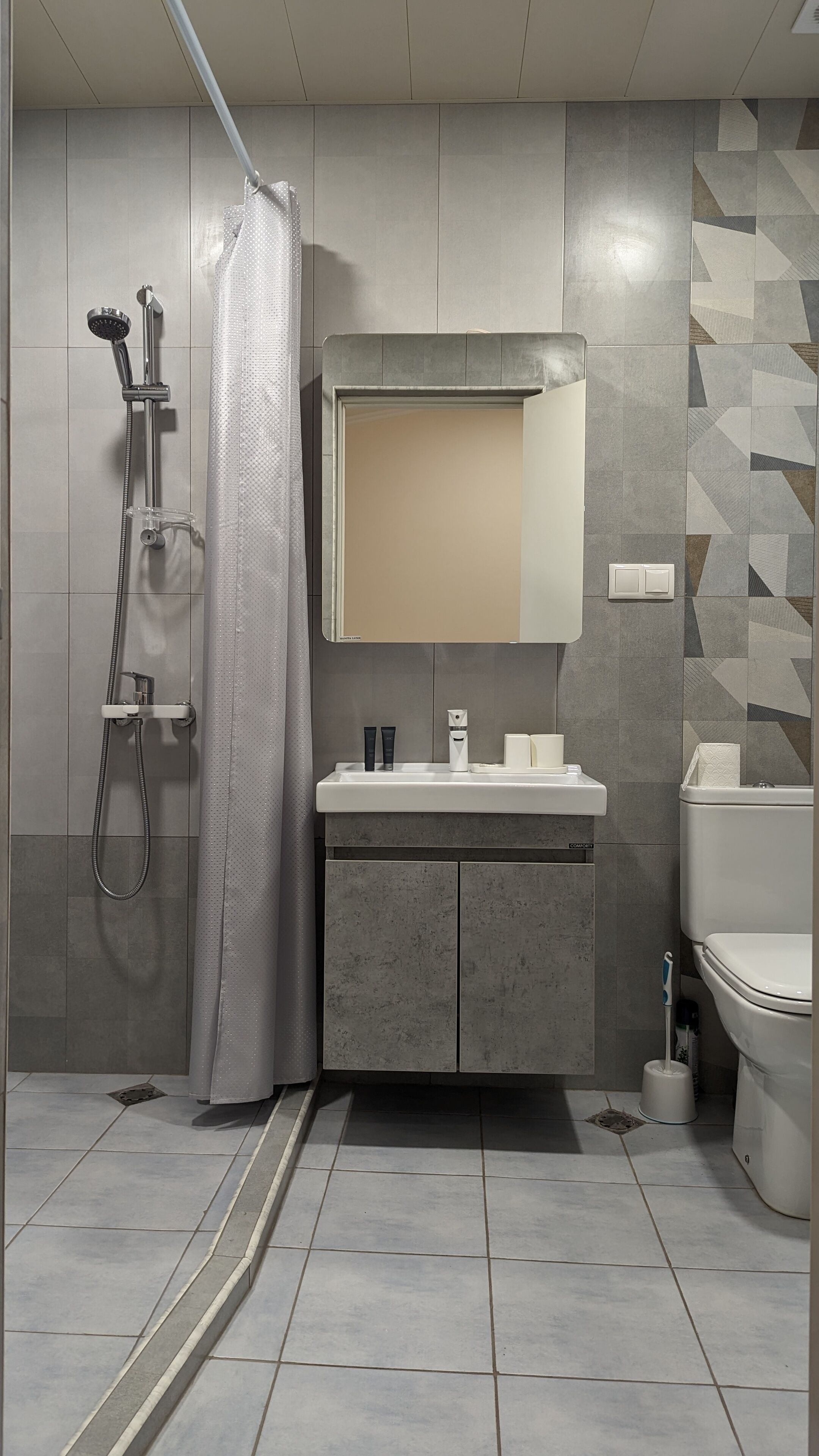 Economy Room, 2 Single Beds, Non Smoking, City View | Bathroom | Shower, hydromassage showerhead, hair dryer, slippers
