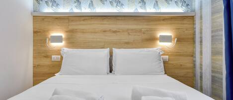 Ylelliset vuodevaatteet, pillowtop-patjalliset sängyt