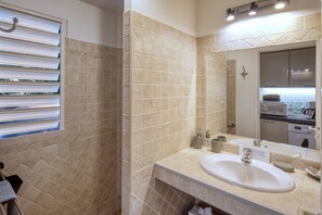 Shower, hair dryer, towels, soap