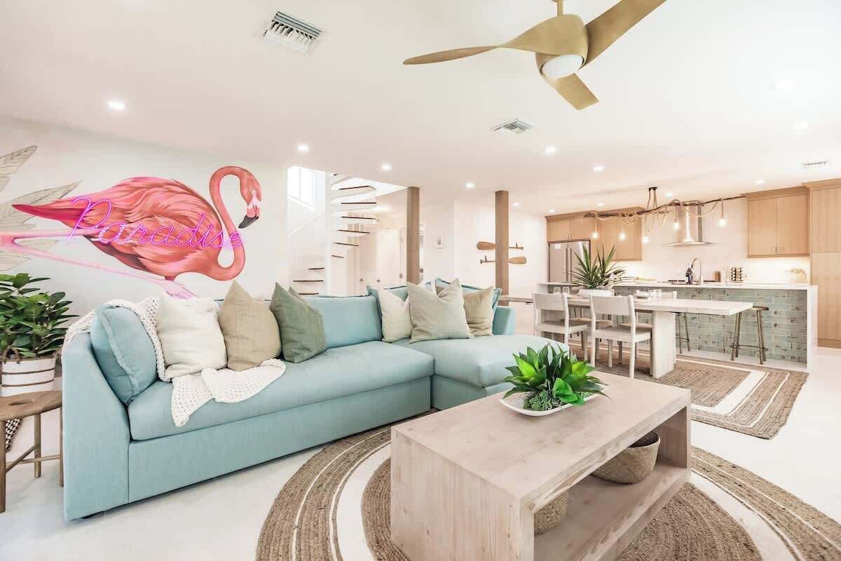 Direct beach access! The living area also includes a comfortable sleeper sofa for extra guests.