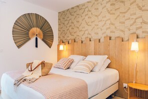 Appartement, 2 slaapkamers, balkon | Een kluis op de kamer, gratis babybedden, gratis wifi, beddengoed