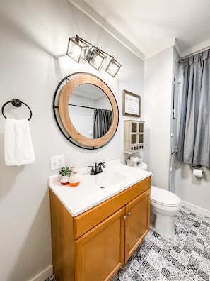 Hair dryer, towels, soap, shampoo