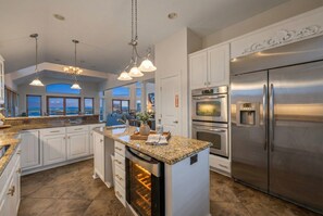 Fridge, microwave, oven, stovetop - Oceanfront Estate | 7 King En-Suites | Heated Pool with Swim-Up Bar | Elevator (NAGS HEAD)