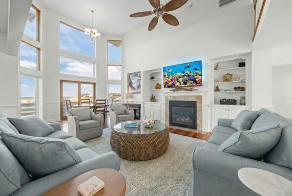 Smart TV, fireplace, table football, books - Oceanfront Estate | 7 King En-Suites | Heated Pool with Swim-Up Bar | Elevator (NAGS HEAD)