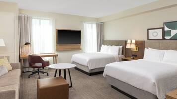 Premium bedding, pillowtop beds, desk, laptop workspace