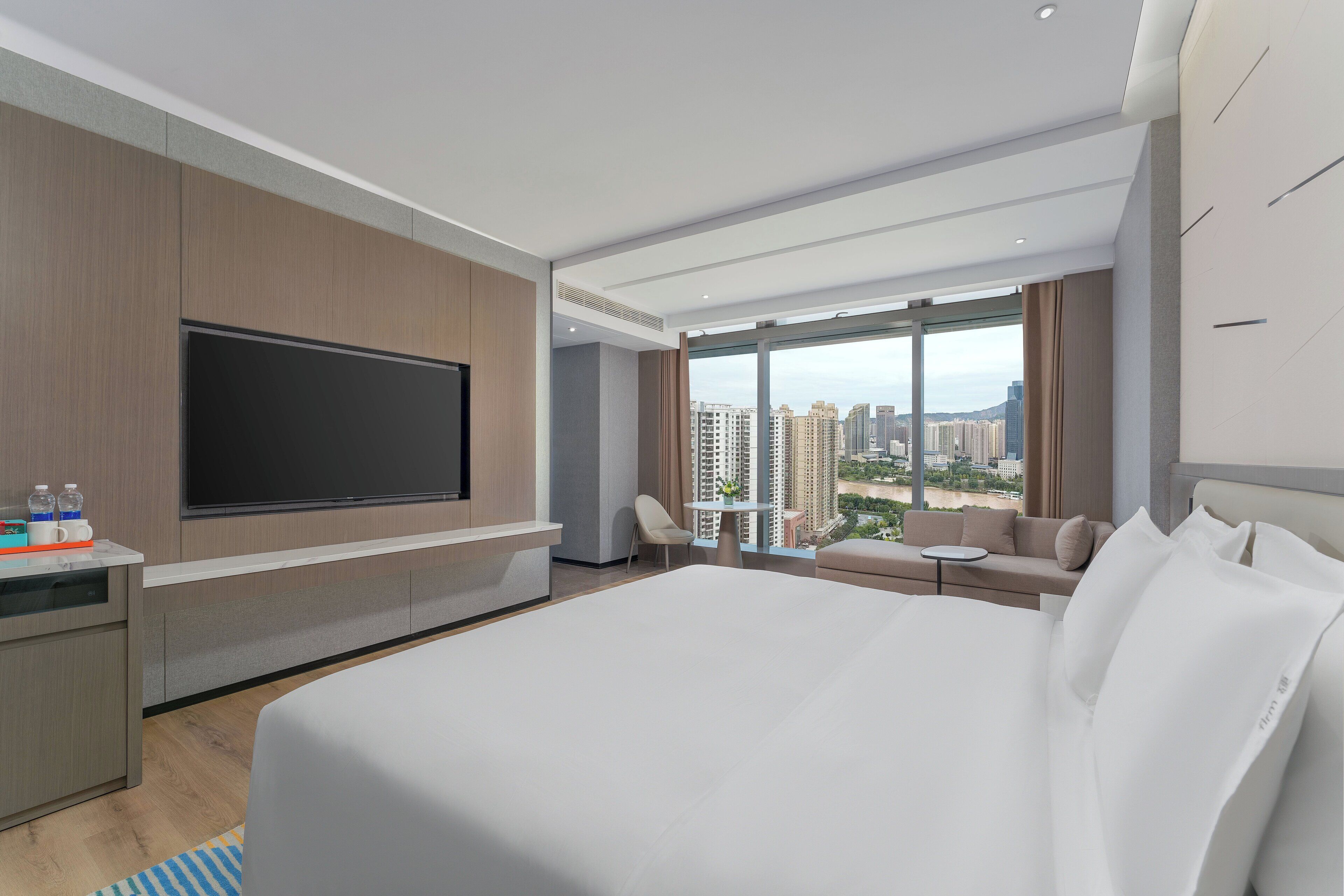 1 King Standard River View | Premium bedding, down duvets, desk, laptop workspace