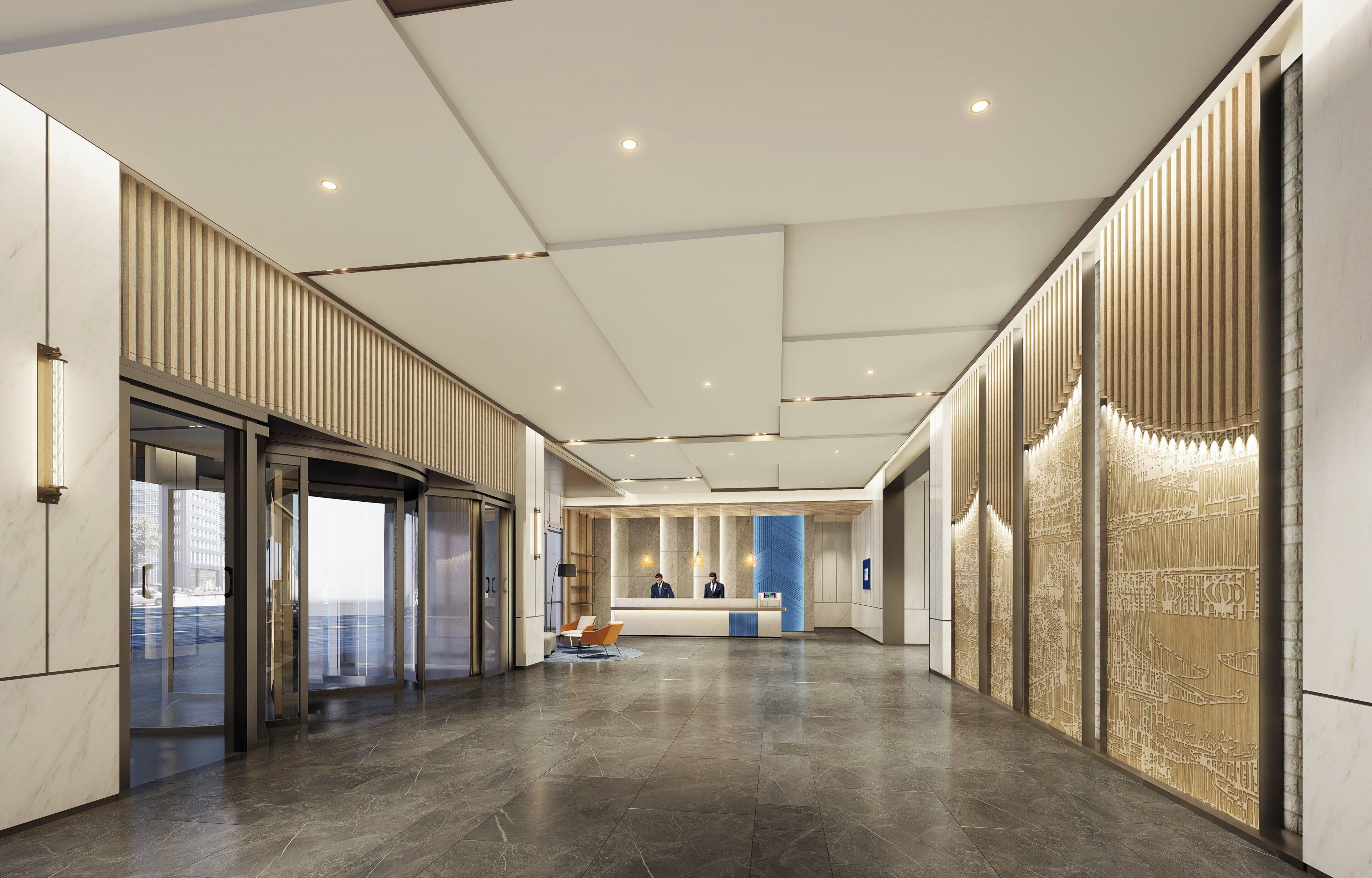 A modern hotel lobby with a reception desk, seating area, and a glass elevator.