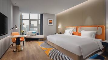 Quarto standard | Edredons de pluma, frigobar, cofres nos quartos, cortinas blackout