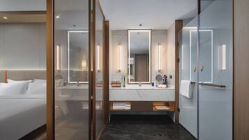 Separate bathtub and shower, rainfall showerhead, hair dryer, bathrobes