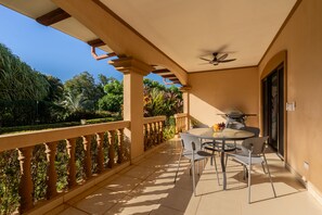 Outdoor dining - Peaceful 2BR condo with pool near ocean (Playa Junquillal)