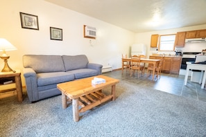 OS Baughman (201) | Living area | 30-inch TV with cable channels, fireplace - Ohiopyle Suites (Ohiopyle)