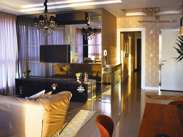 Deluxe Apartment, Beach View | Living area | 45-inch Smart TV with digital channels, Netflix, pay films