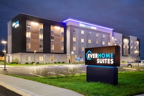 A modern hotel building with a sign reading 'Everhome Suites.' - Everhome Suites Lexington - Horse Park (Lexington)