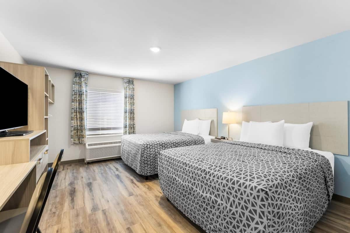 Desk, laptop workspace, free WiFi, bed sheets