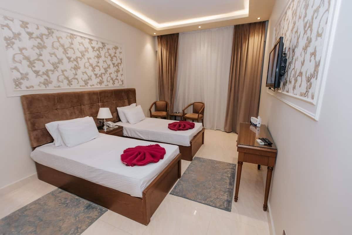 Habitación Signature con 1 cama doble o 2 individuales, vistas al jardín | 1 dormitorio, sábanas de algodón egipcio, ropa de cama de alta calidad
