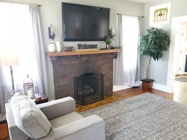 Smart TV, fireplace, books