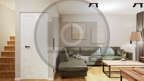 A modern living room with a sofa, a coffee table, and a lamp. - Ferienhauspark Hasselfelde (Oberharz am Brocken)