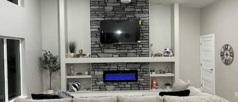 Smart TV, fireplace, ping pong