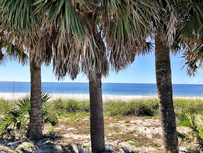 "Sandals and Sunsets" located in a gulf front community! Steps to paradise! Pet friendly!