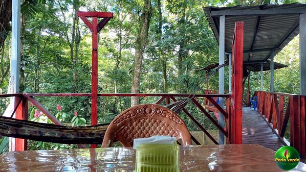 Comfort Bungalow | Living area | Printers - Perla verde hostel y tours en la zona (La Virgen)