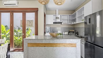 Design Villa | Private kitchen | Fridge, microwave, stovetop, electric kettle
