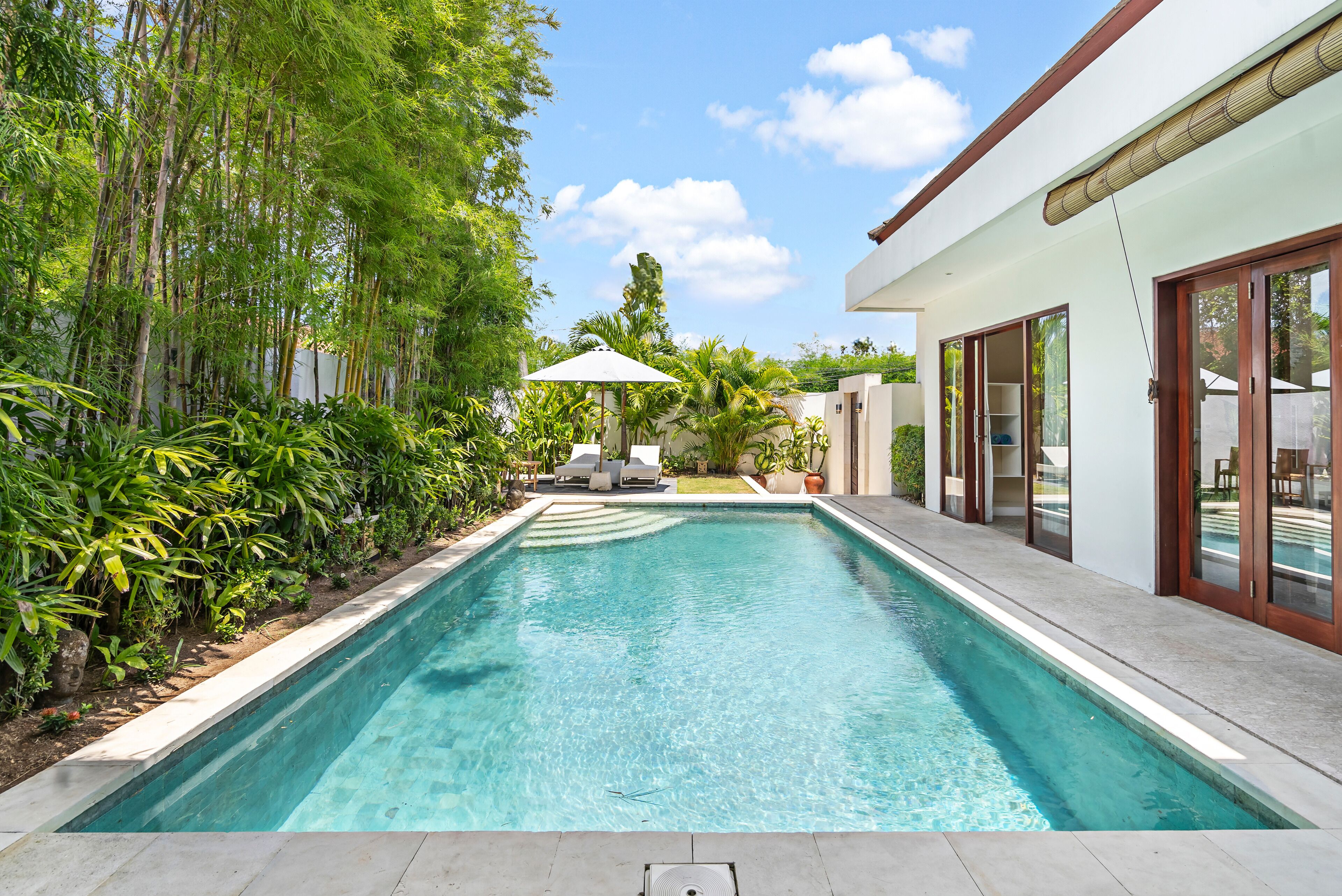 Outdoor pool, pool umbrellas, sun loungers