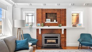 Smart TV, fireplace, books