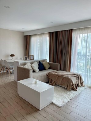 Deluxe Condo, Balcony, Sea View | Living area - Seven Seas Condo Resort by PSR (Pattaya)