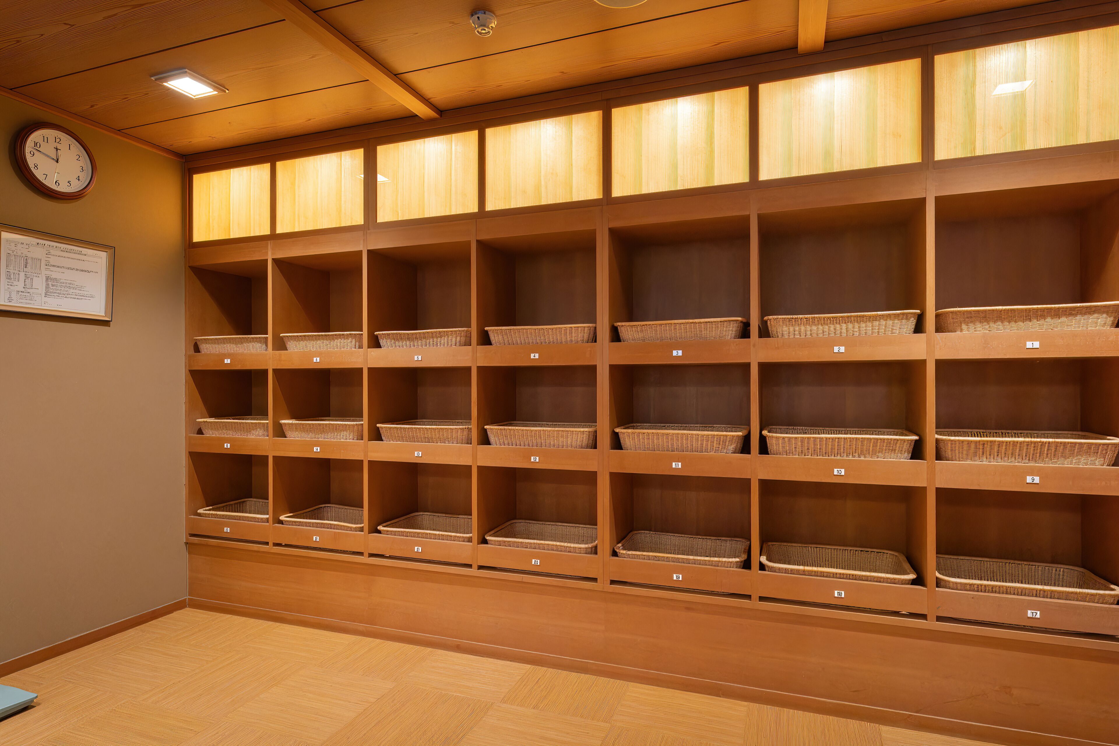 A storage room with wooden shelves and baskets.