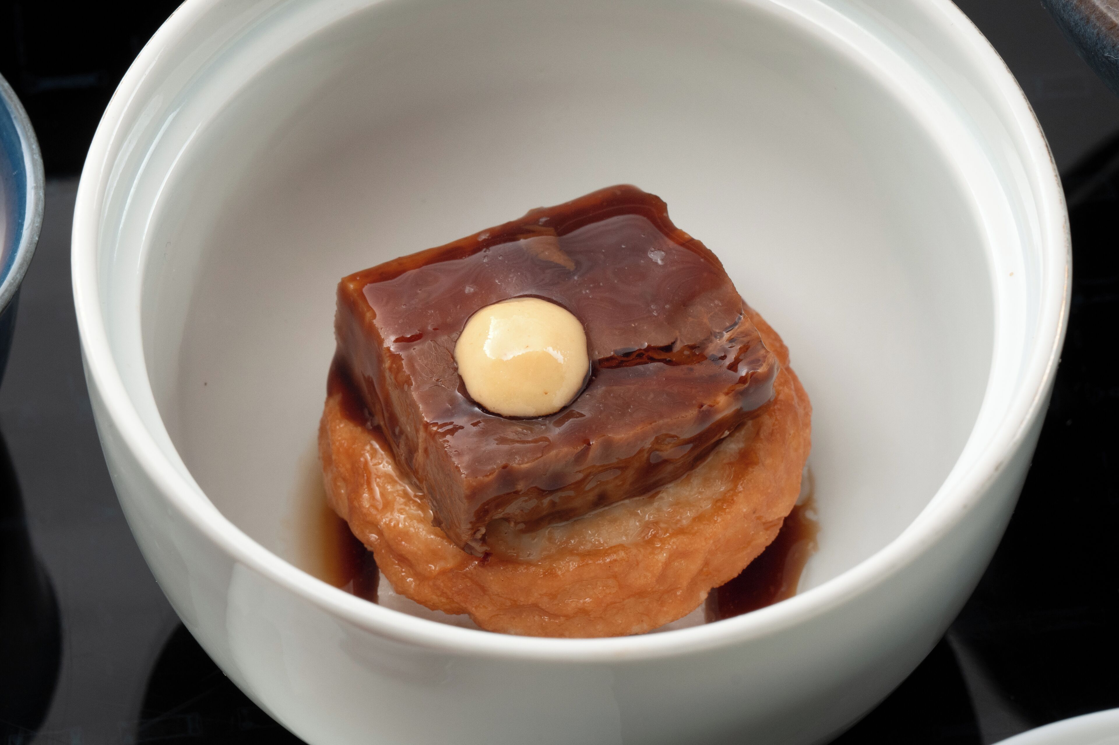 A dessert in a white bowl.