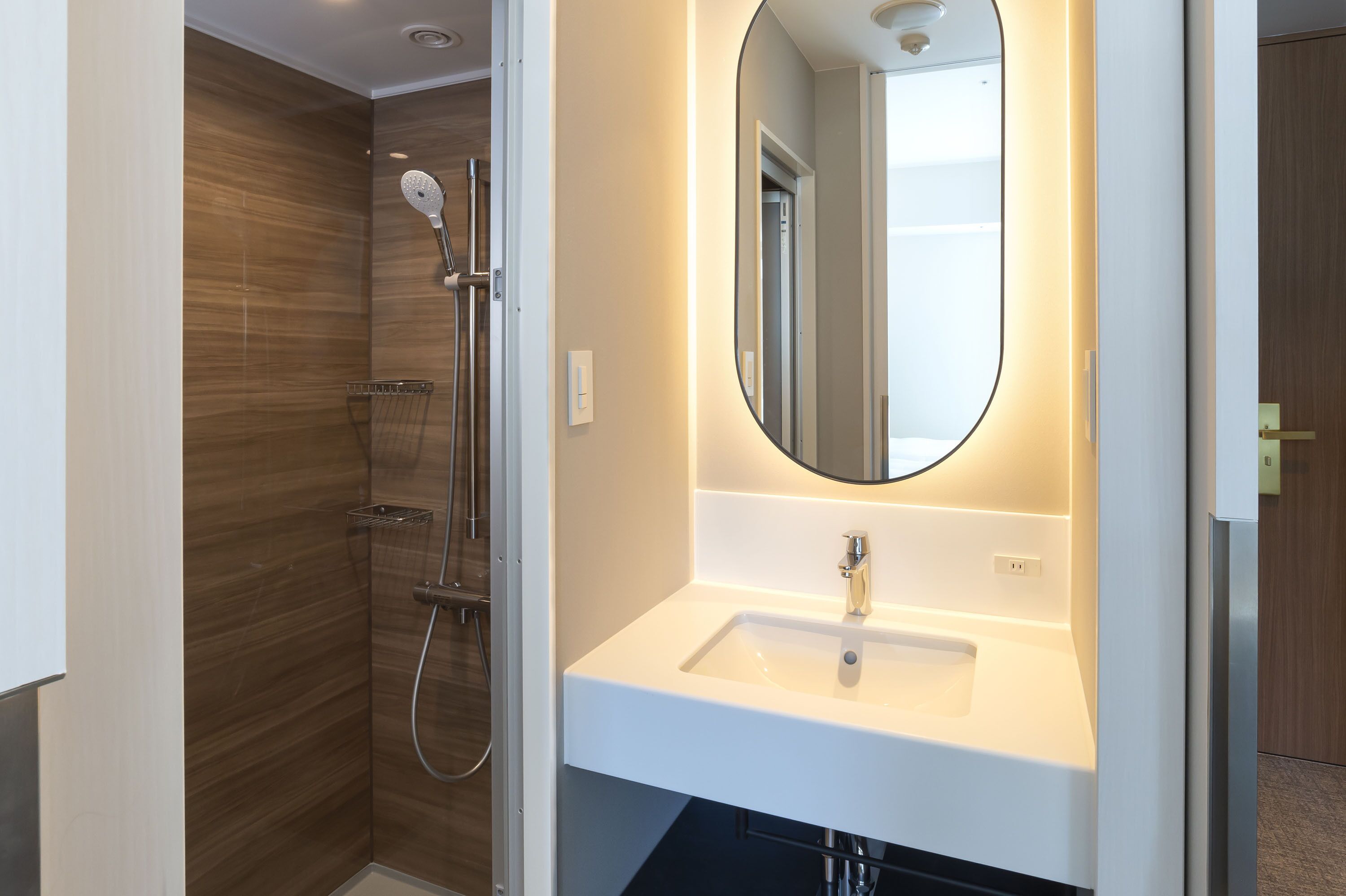 Shower, hair dryer, slippers, towels