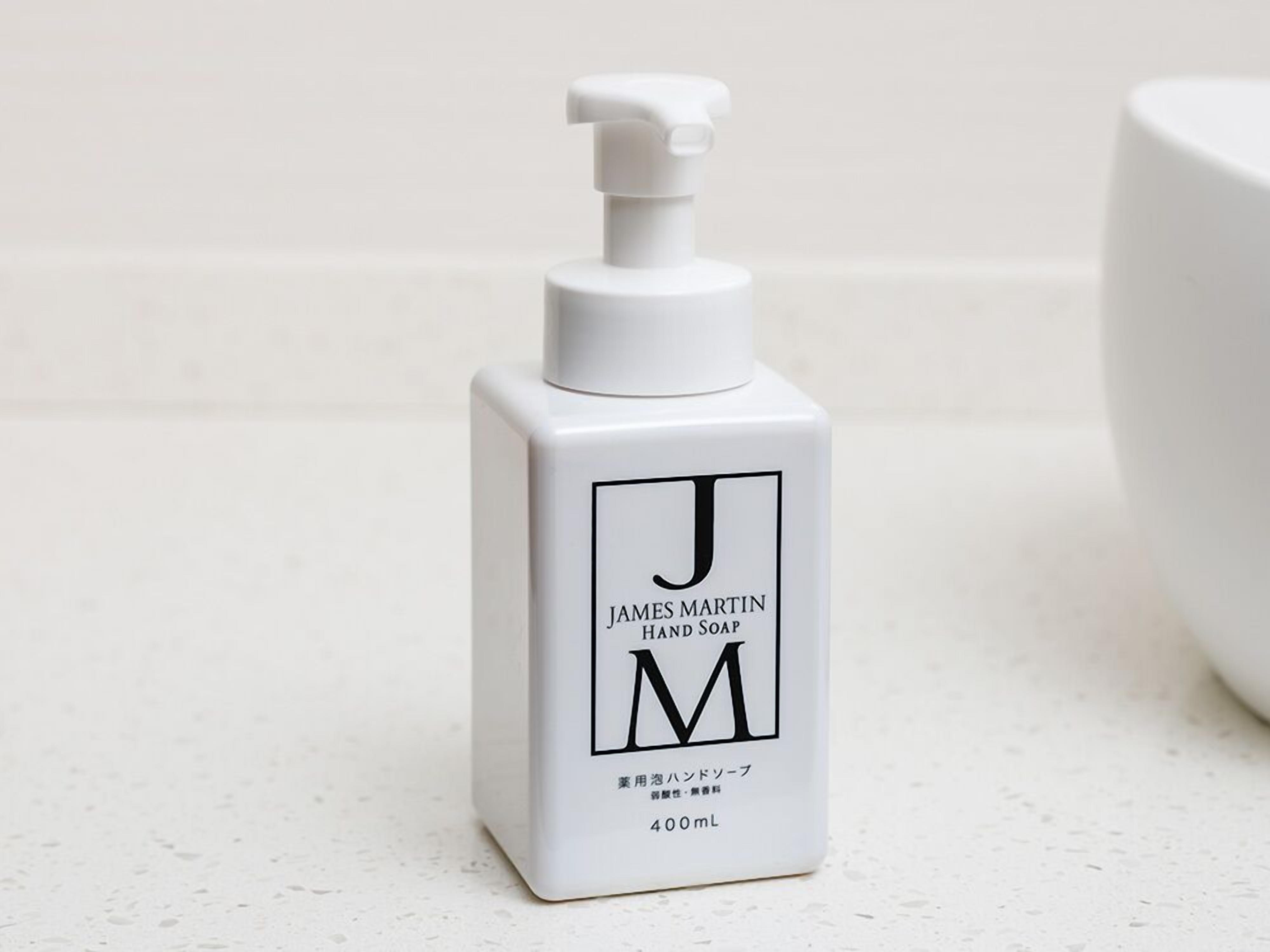 A white James Martin hand soap bottle with a pump dispenser, labeled with the letters 'J' and 'M', and a capacity of 400mL.