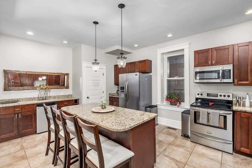 Walk to Forest Park | Fire Pit & Porch Swing