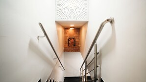 A staircase with metal railings leading to a lower level. - Taj Palace (Mumbai)