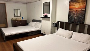 Family Room | Desk, WiFi (free), bed sheets - Remedios Hotel Manila City Center (Manila)