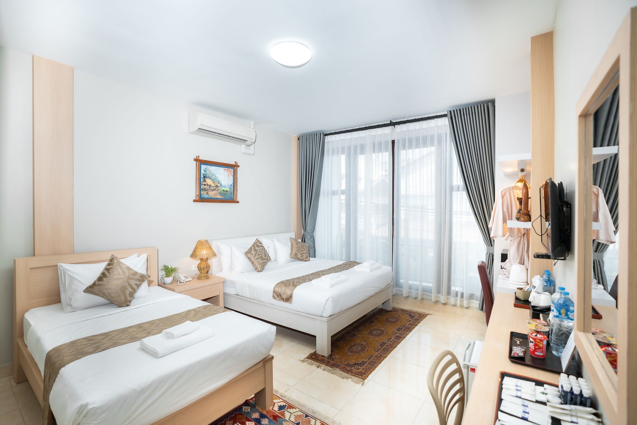 Triple Room | Premium bedding, minibar, in-room safe, desk