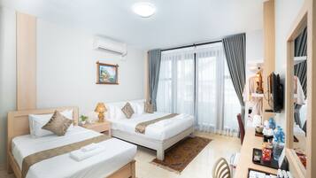 Triple Room | Premium bedding, minibar, in-room safe, desk