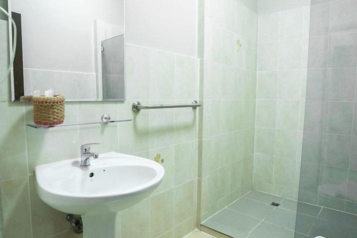 Shower, designer toiletries, hair dryer, bathrobes