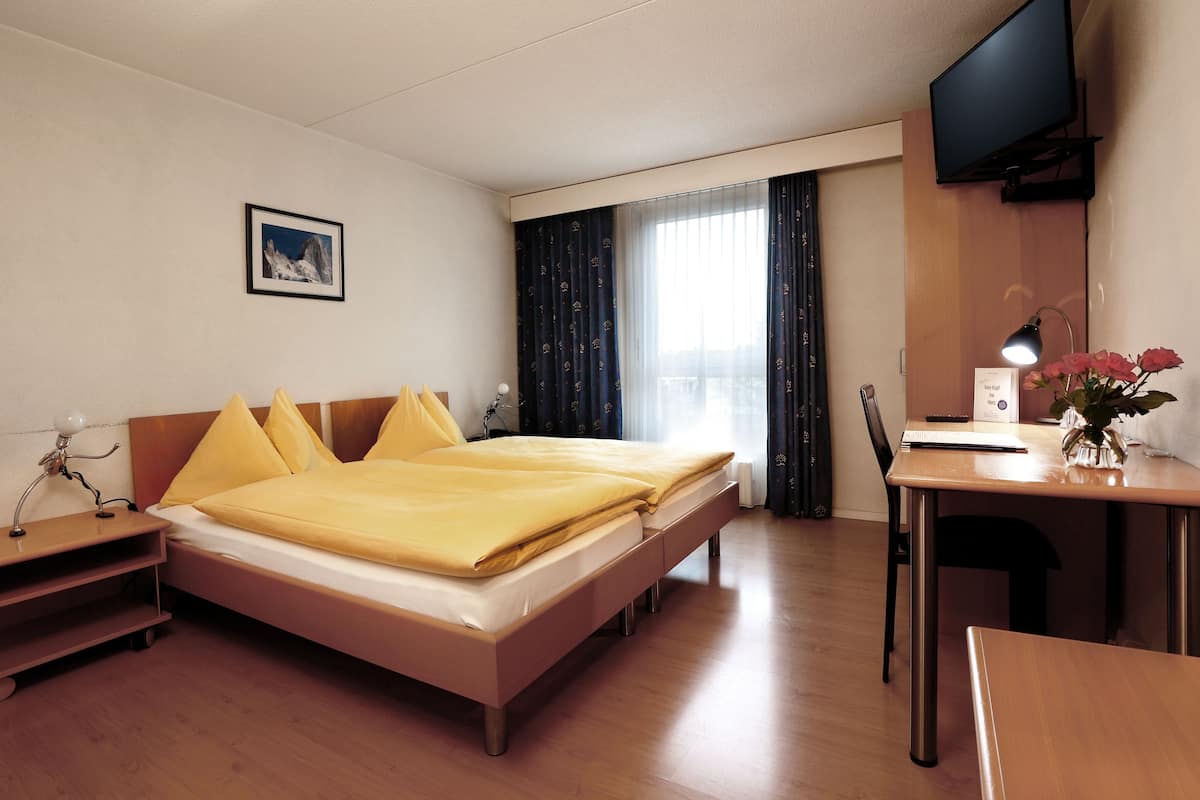 Habitación Confort con 1 cama matrimonial o 2 individuales | 1 habitación, edredón, escritorio y wifi gratis