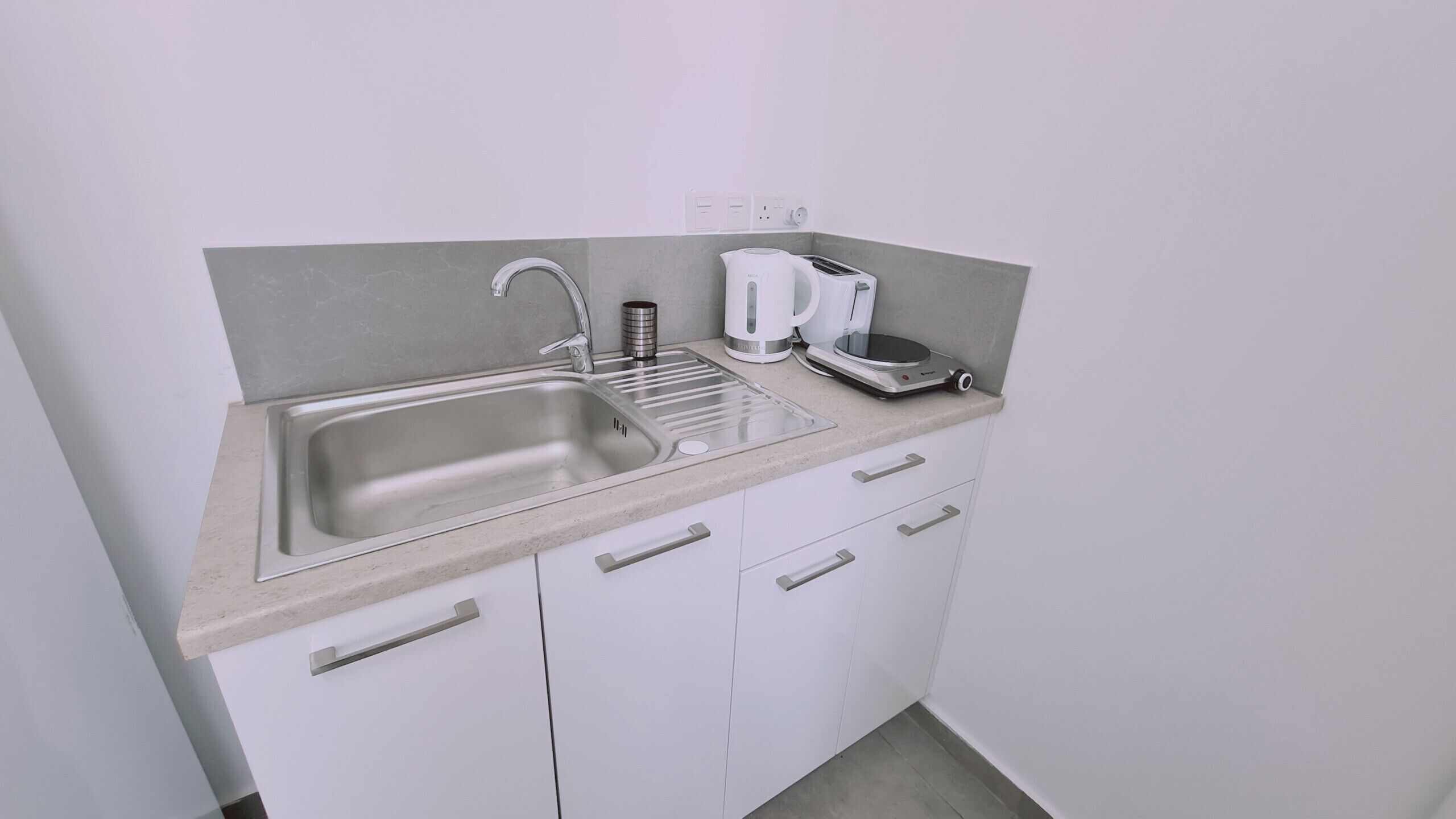 Fridge, microwave, electric kettle, toaster