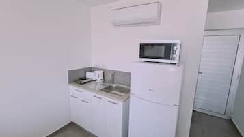 Fridge, microwave, electric kettle, toaster
