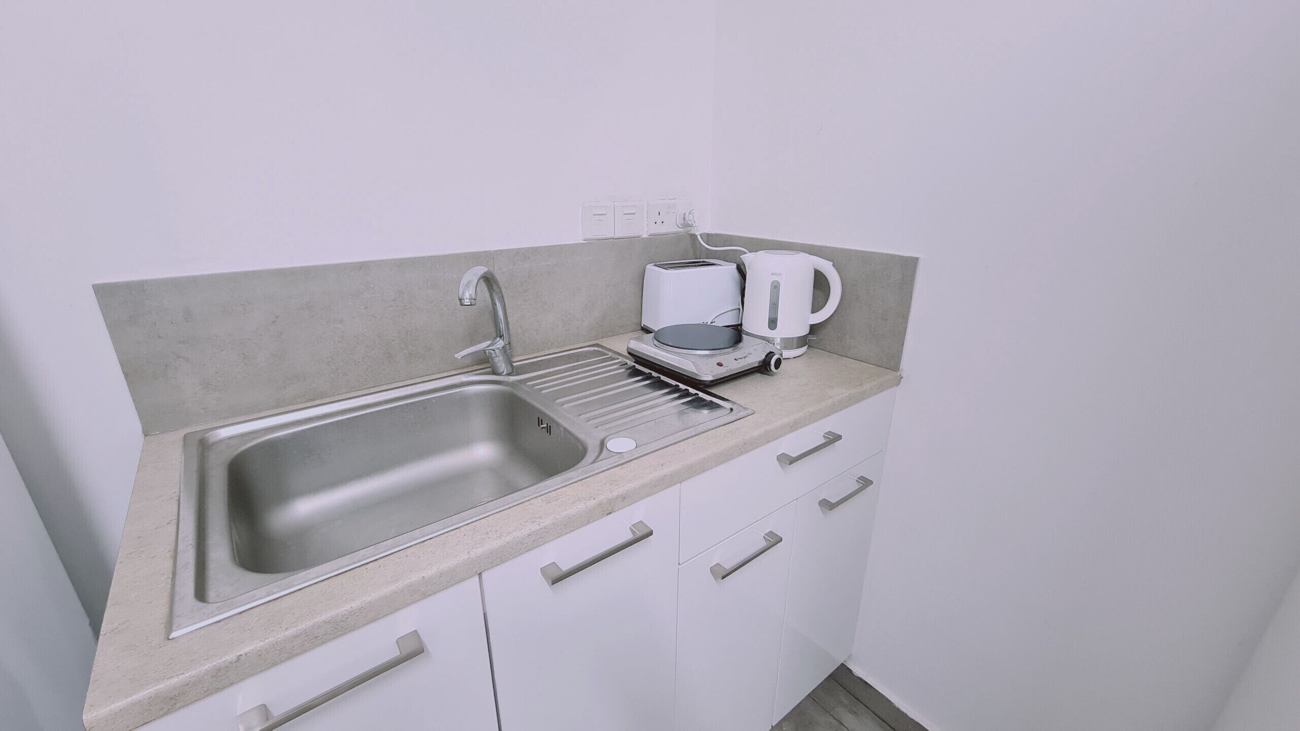 Fridge, microwave, electric kettle, toaster