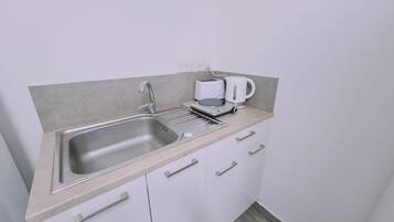 Fridge, microwave, electric kettle, toaster