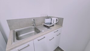 Fridge, microwave, electric kettle, toaster