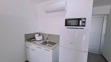 Fridge, microwave, electric kettle, toaster
